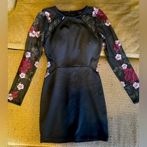 Cocktail dress. Cute side cut outs.